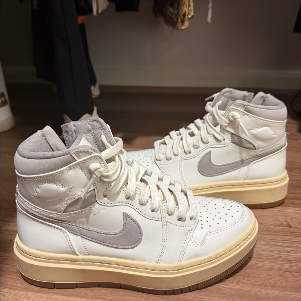 Woman’s high top Nike Jordans